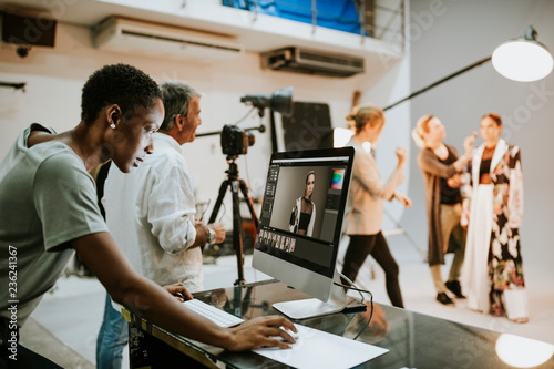 Art director checking photos on a monitor