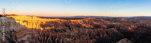 Aerial panoramic view of the beautiful American Canyon Landscape during a vibrant sunrise. Taken in Bryce Canyon National Park, Utah, United States