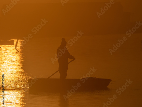 fisherman and sunrise