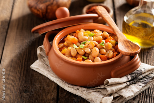 Baked beans in tomato sauce and greens.