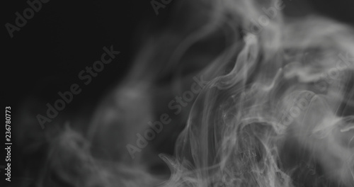closeup vapor stream from right on black background
