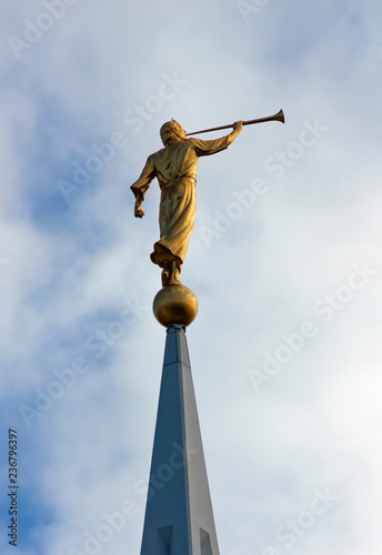 Sculpture of angel moroni atop of a Mormon Temple.