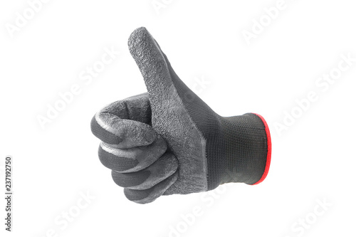 Black and gray glove showing the thumbs up sign for good job isolated on white