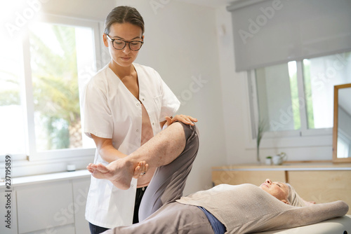 Senior woman with her physiotherapist