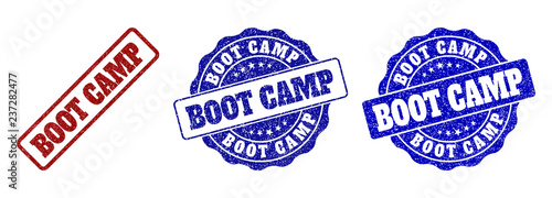 BOOT CAMP grunge stamp seals in red and blue colors. Vector BOOT CAMP signs with grunge texture. Graphic elements are rounded rectangles, rosettes, circles and text titles.
