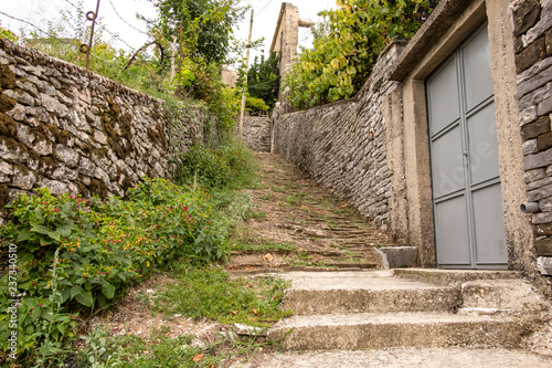 A narrow street in Gjirokaster, Albania - a town surrounding the Ali Pasha's fortress