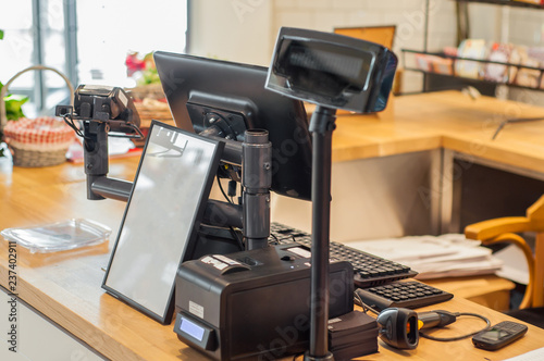 Cash register with barcode reader in grocery store