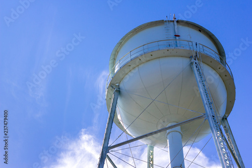 White Water Tower in Blue Sky with Copy Space