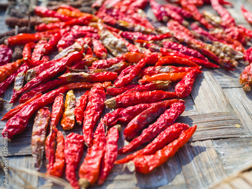 Close up of dried red chilli on baboom tray