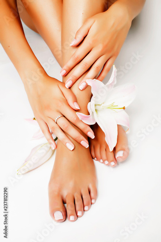manicure pedicure with flower lily close up isolated on white pe