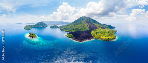 Aerial view Banda Islands Moluccas archipelago Indonesia, Pulau Gunung Api, lava flows, coral reef white sand beach. Top travel tourist destination, best diving snorkeling.