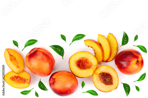 ripe nectarine with leaves isolated on white background with copy space for your text. Top view. Flat lay pattern