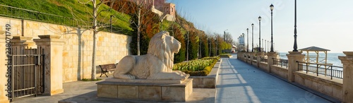 panorama with sculpture of lion on the embankment in Odessa city in Ukraine