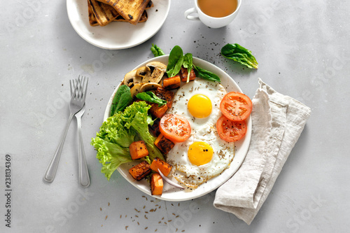 Breakfast table Breakfast plate fried eggs vegetables mushrooms toast top view healthy table