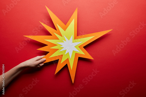 top view of empty orange bang sign on red background