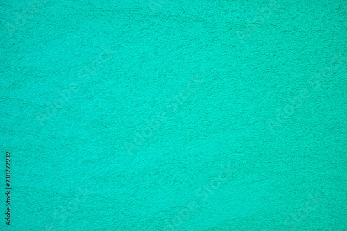 The texture of plastered tiffany blue or turcuoise wall, background