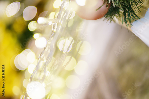 Blurred image of bright festive decorations celebrating Christmas and New Year. 