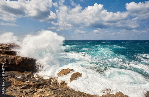 Waves beat on the rocky shore, Mediterranean Sea.