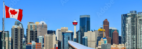 Canadian flag in Calgary city skyline at sunny day, Alberta,Canada