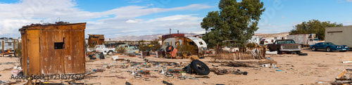 desert junkyard panorama in California