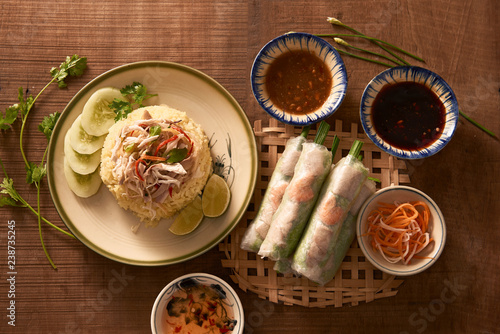 Assorted asian dinner, vietnamese food. Chicken rice, spring rolls