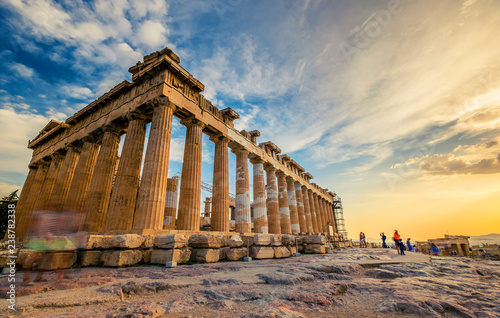 Low angle perspective of columns of the Parthenon at sunset, Acropolis, Athens