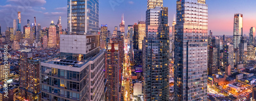 Aerial view of New York City skyscrapers at dusk as seen from above the 42nd street canyon