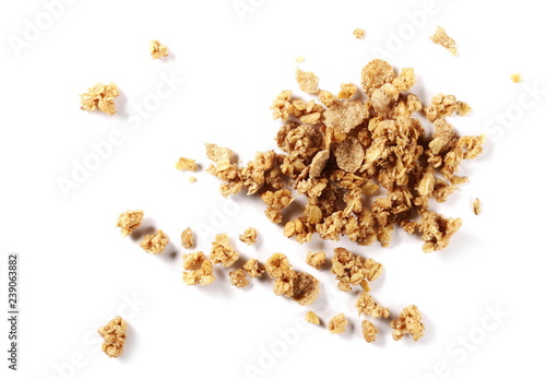 Crunchy granola, muesli pile with nuts isolated on white background, top view