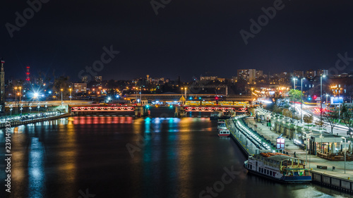 CITY AT NIGHT - Ship on the river, bridge and landscape of Szczecin in the night illumination