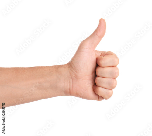 Man showing thumb up gesture on white background, closeup of hand