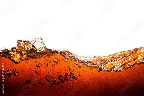 cola soda with sparkling bubbles isolated on white