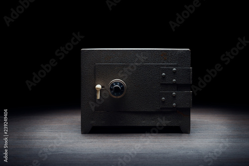 Steel bank safe on a dark background