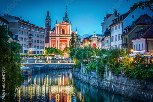 Evening view of the bridge and Ljubljanica river in the city center. Ljubljana, capital of Slovenia.