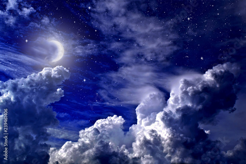 Stars, moon and cumulonimbus in the night sky