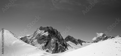 Black and white panorama of snowy mountains