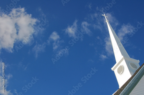 Church steeple with clouds in background
