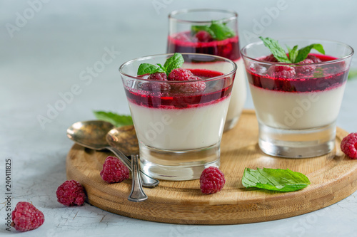 Vanilla Panna cotta with raspberry and mint.