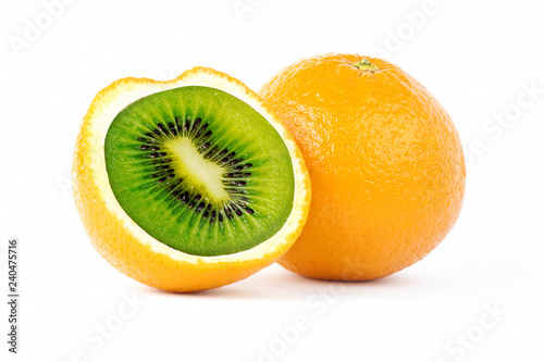 Creative photo manipulation of sliced orange with green kiwi inside isolated on white background