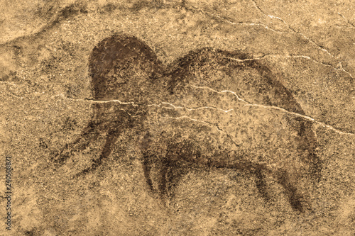 image of a mammoth ancient man on the wall of the cave. history, archaeology.