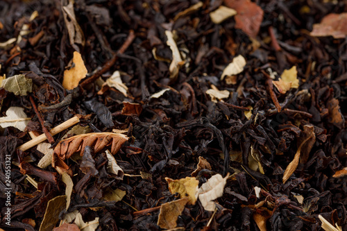 Dry fruit black currant tea leaf texture background. Macro.