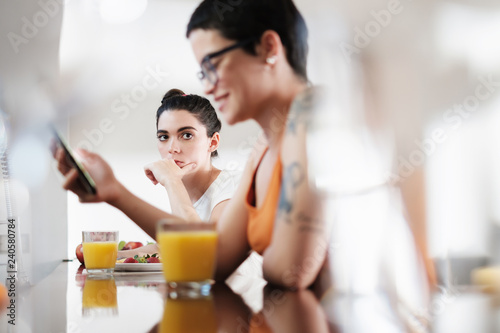 Woman is Jealous of Gay Partner Using Smartphone