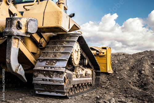 bulldozer moving dirt on the construction site