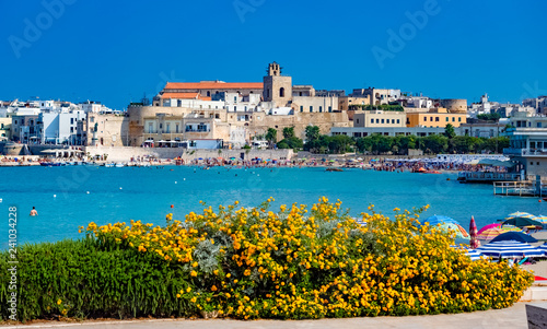 Cityscape of the beach and city architecture in summer holiday in Otranto, Lecce region in Italy