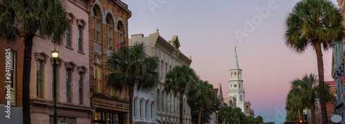 Beautiful panoramic view on the uban streets in Downtown Charleston, South Carolina, United States. Taken during a vibrant sunrise.