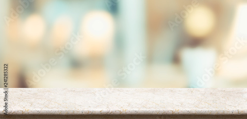 Empty glossy marble table and blurred soft light table in restaurant with bokeh background. product display template.Business presentation.