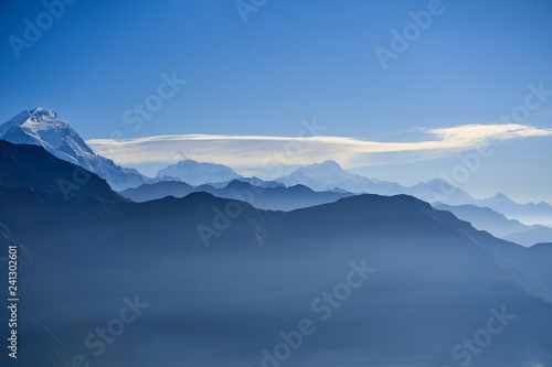 Fog above mountain in valley Himalayas mountains