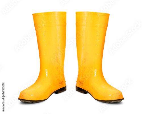 Yellow rubber boots isolated on white background. Dirty boots. ( Clipping path )