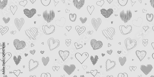 Hand drawn background with hearts. Seamless grungy wallpaper on surface. Chaotic texture with many love signs. Lovely pattern. Line art. Black and white illustration for design