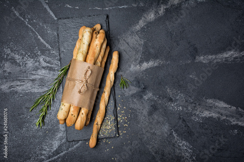 Top view of traditional italian appetizer grissini with rosemary spice