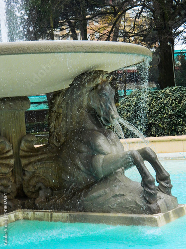 Federico Fellini Park with Fountain of Four horses in Rimini, Italy. Winter walk in the park in Italy.